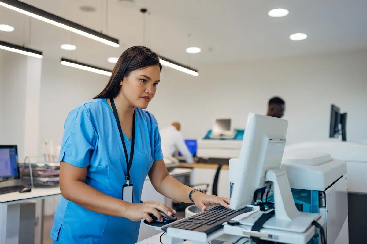 Nurse entering charting info