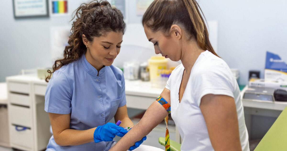 Phlebotomist doing blood test