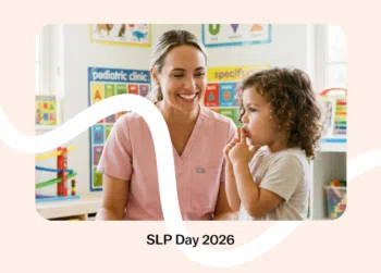 Speech-language pathologist working with a child in a pediatric therapy setting for SLP Day 2026